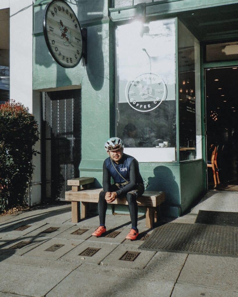 Gene sitting in front of his favorite coffee shop during a ride. 