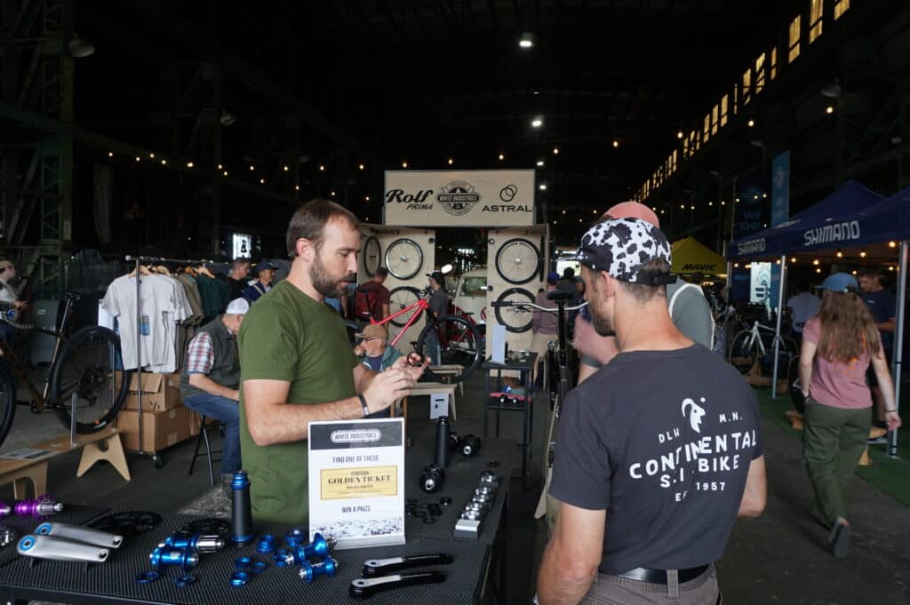 Alec White talking to customers at the MADE Show 2026